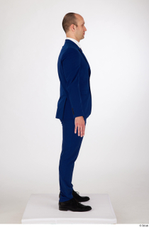Serban a poses black oxford shoes blue suit blue suit…